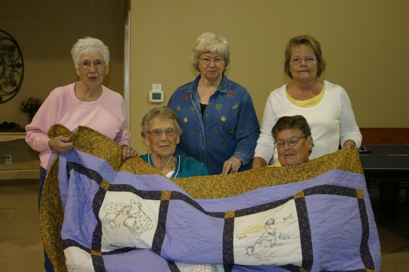 Quilt with ladies